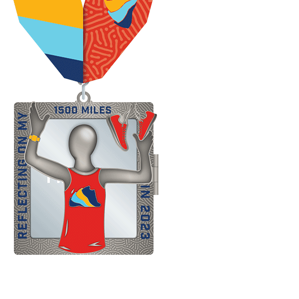 Run The Year fitness challenge medals. This 1500 miles in 2023 finisher medal opens to reveal a mirror with the word "finisher" on it so you can see your reflection as the finisher.