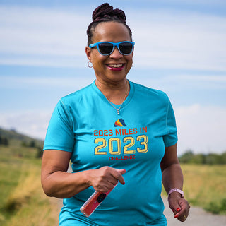 The Run The Year 2023 miles in 2023 challenge tech shirt. This custom-dyed tech shirt is a performance-grade garment engineered for races or just looking stylish! Made of custom fabric that is light, comfortable, and durable.